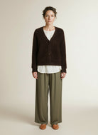 Full body view of the model wearing Red Button Cardigan Fuzzy Espresso