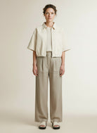 Full body view of the model wearing Yaya Loose-fit Jacket With A Denim Look Cloud Creme White