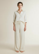 Full body view of the model wearing Msch Copenhagen Mschdaria Pants Sand Melange