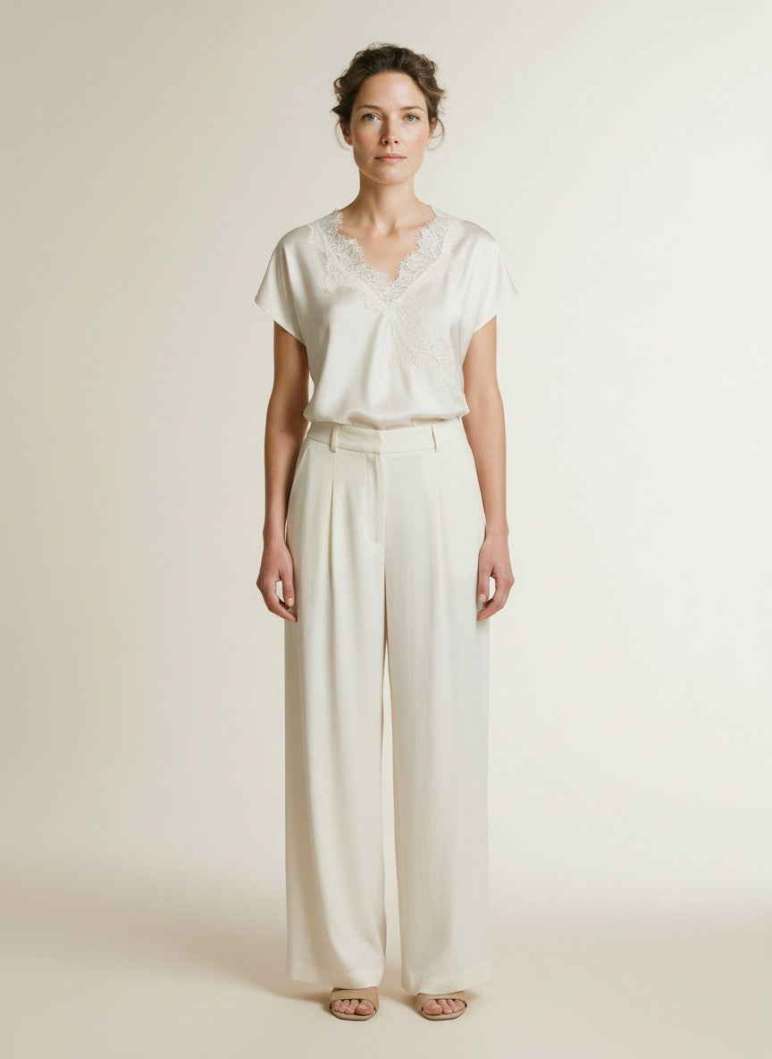Full body view of the model wearing Co'couture Iduncc Lace Ss Blouse Off White
