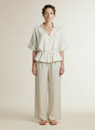 Full body view of the model wearing Red Button Drew Drawstring Linen/co Stripe Darksand