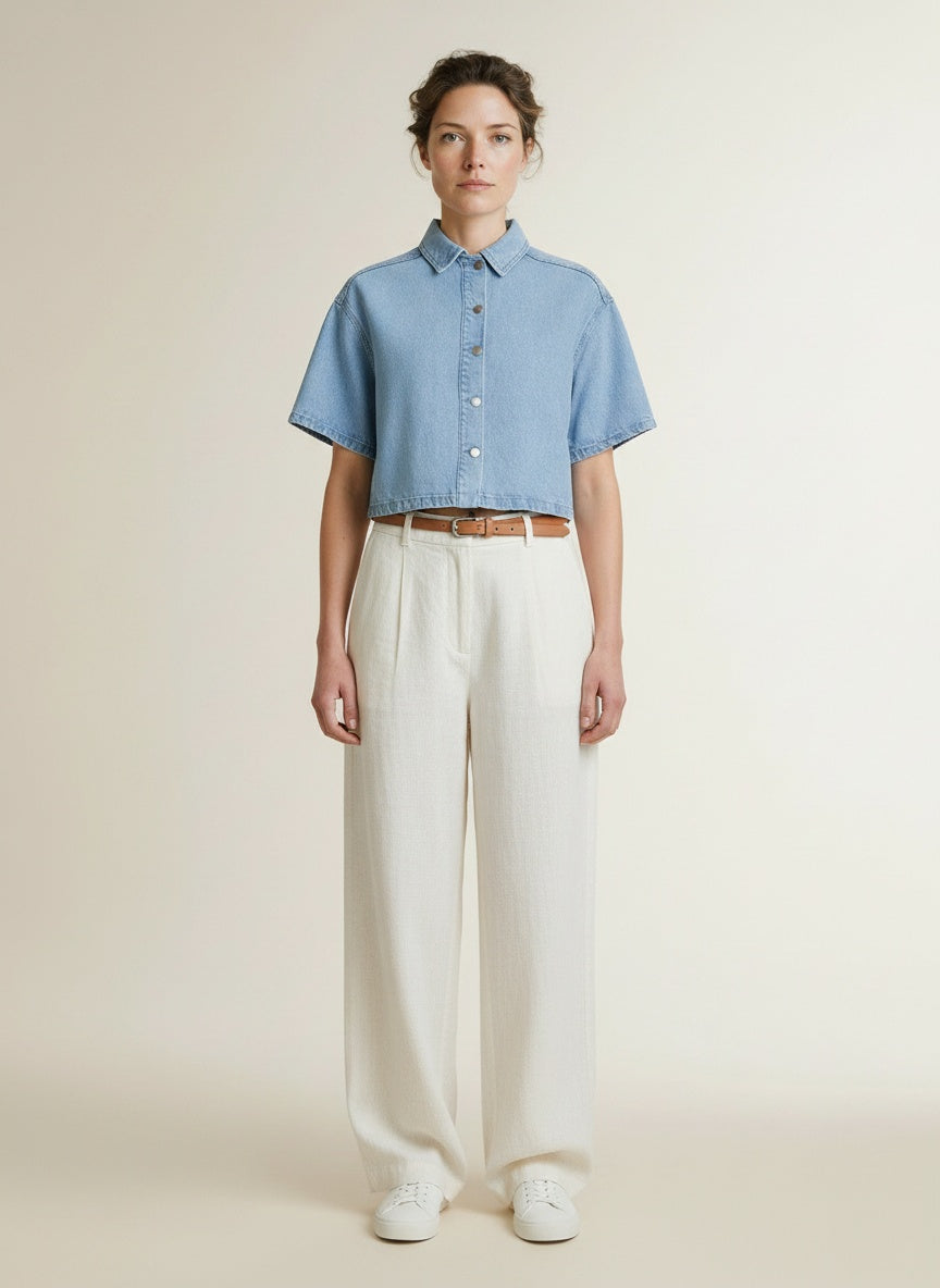 Full body view of the model wearing Msch Copenhagen Mschsaphina 2 4 Shirt Light Blue Wash
