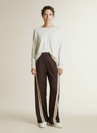 Full body view of the model wearing Co'couture Alinicc Double Panel Pant Dark Brown L34