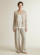 Full body view of the model wearing Red Button Cardigan Ajour Sparkle Lightsand