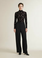 Full body view of the model wearing Msch Copenhagen Mschisa Illenora M Top Aop MolÃ© Flower