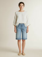 Full body view of the model wearing Red Button Sienna Short Embroidery Bleach