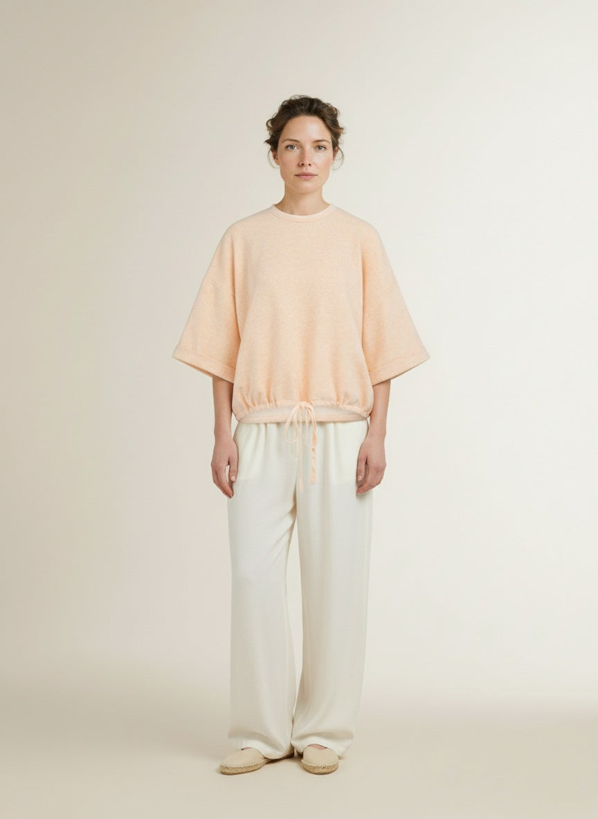 Full body view of the model wearing Yaya Short Sleeve Sweatshirt Amberlight Orange Melange