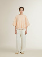 Full body view of the model wearing Yaya Short Sleeve Sweatshirt Amberlight Orange Melange