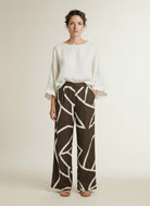 Full body view of the model wearing Yaya Woven Trousers With Wide Legs Chocolate Martini Brown Des