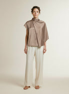 Full body view of the model wearing Co'couture Iduncc Cape Ss Blouse Walnut