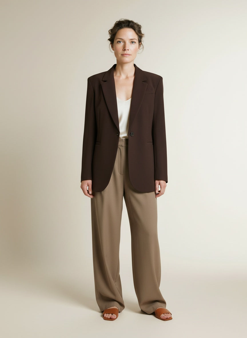 Full body view of the model wearing Msch Copenhagen Mschvega Loose Blazer MolÃ©