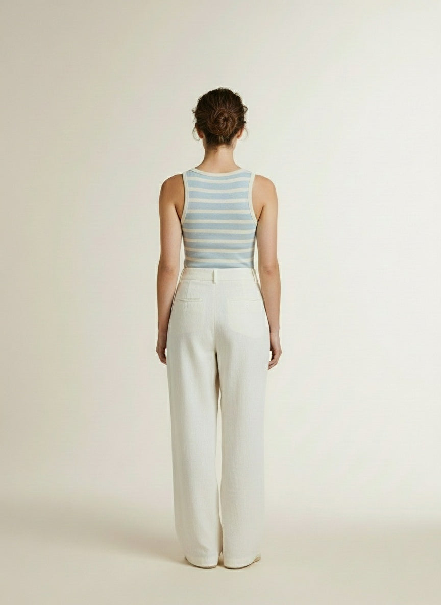 Back pose of the model wearing Co'couture Grannycc Rib Emb. Tank Top Offwhite/paleblue