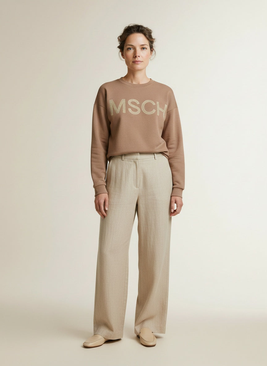 Full body view of the model wearing Msch Copenhagen Mschmela Briena Msch Sweatshir Mountain T Oatm